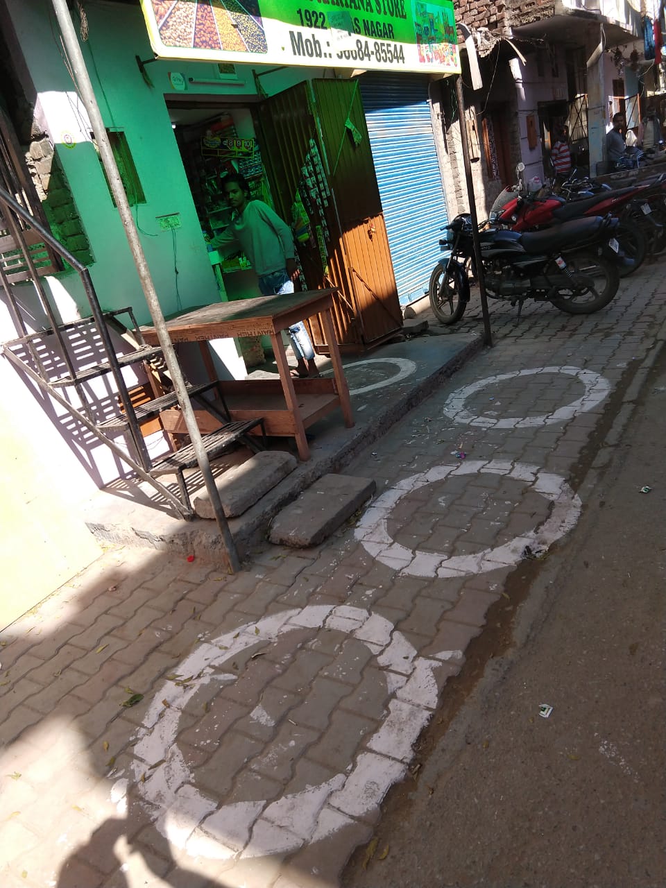 Social distance markings being done in city markets