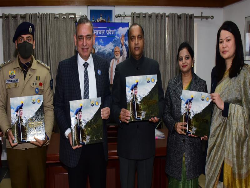CM presented with Coffee Table Book by DGP