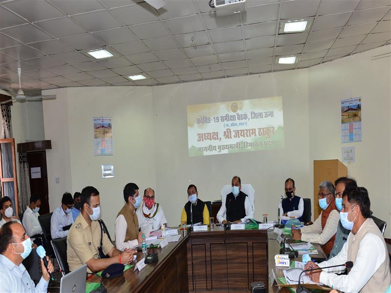 Chief Minister Jai Ram Thakur while presiding over the meeting to review the Covid-19, review of drought situation in the district and also progress in implementation