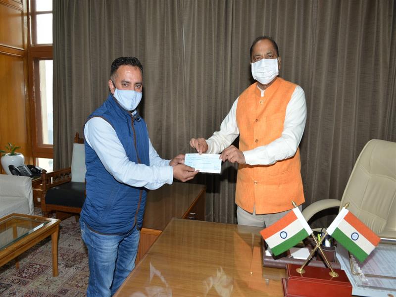 Chief Minister Jai Ram Thakur was presented a cheque of Rs. 21000  by State Vice President  Himachal Pradesh Teachers Confederation Dr. Mamraj Pundir towards Chief Minister Relief