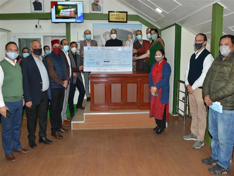 Chief Minister Jai Ram Thakur was presented a cheque of Rs. 11,11,111 by  the officers of Excise and Taxation Department  including Assistant  Commissioners Association here yesterday  towards