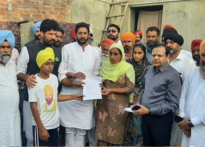 raja warring hands over appointment letters to family members of seven farmers lost lives during farmers agitation