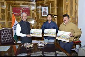 Governor releases Coffee Table Book of HP University